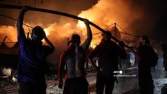 Greece counts cost as firefighters master fires around Athens